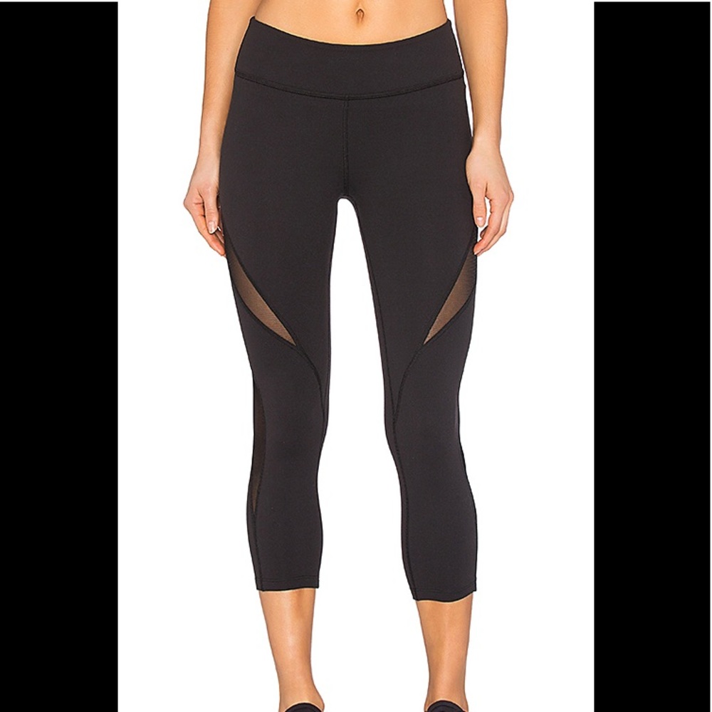 Brand new Beyond Yoga Black Crop sz small